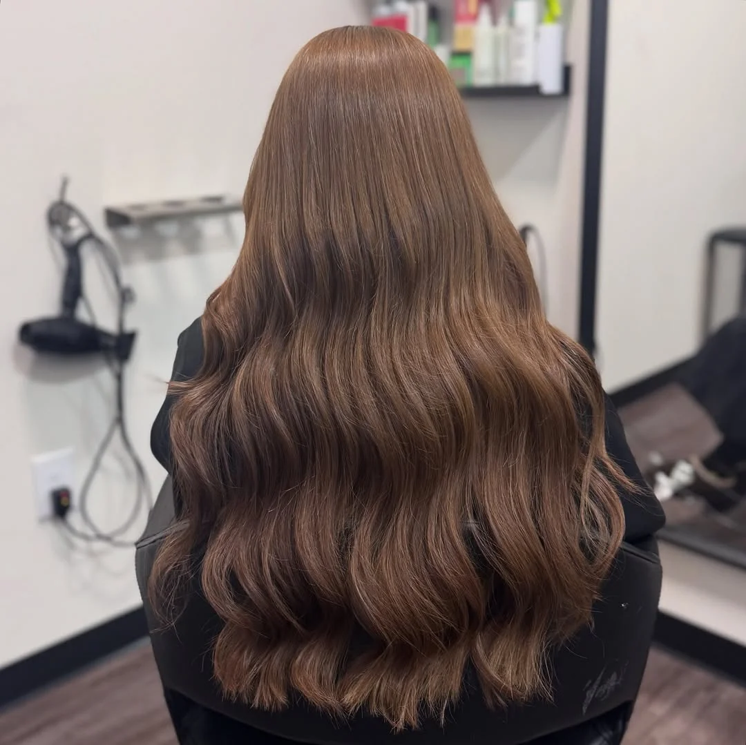 golden summer honey brown hair color 2026 Deep Chocolate Waves with Subtle Honey Dimension