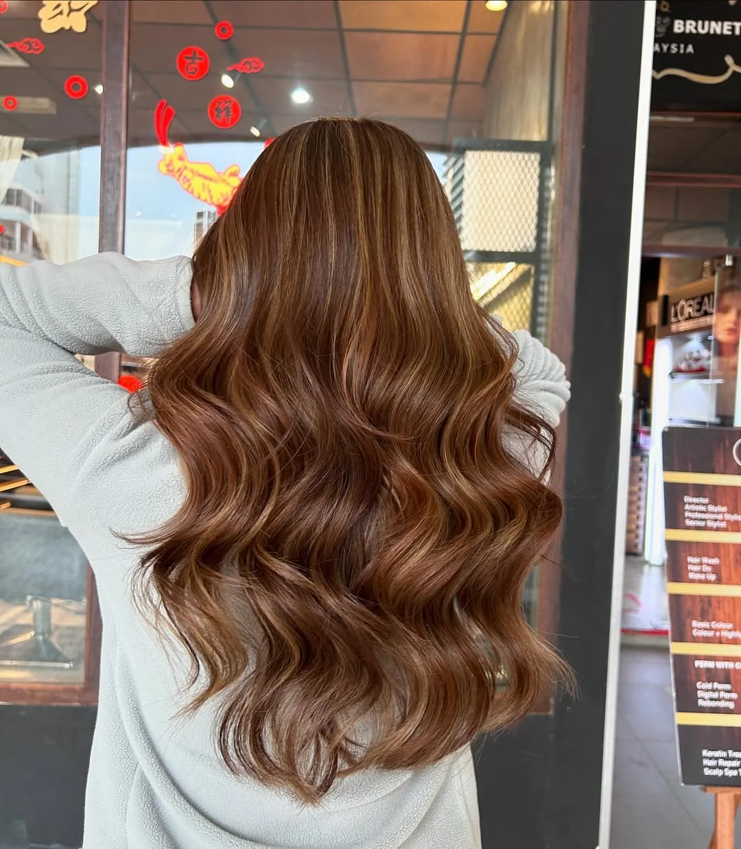 golden summer honey brown hair color 2026 Glossy Chestnut Brown with Subtle Caramel Light