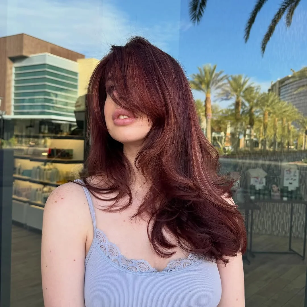 gorgeous summer hair color ideas 2026 Muted cherry red with soft movement