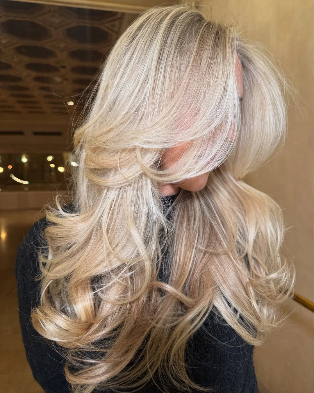 gorgeous summer hair color ideas 2026 Champagne blonde with voluminous cascading layers