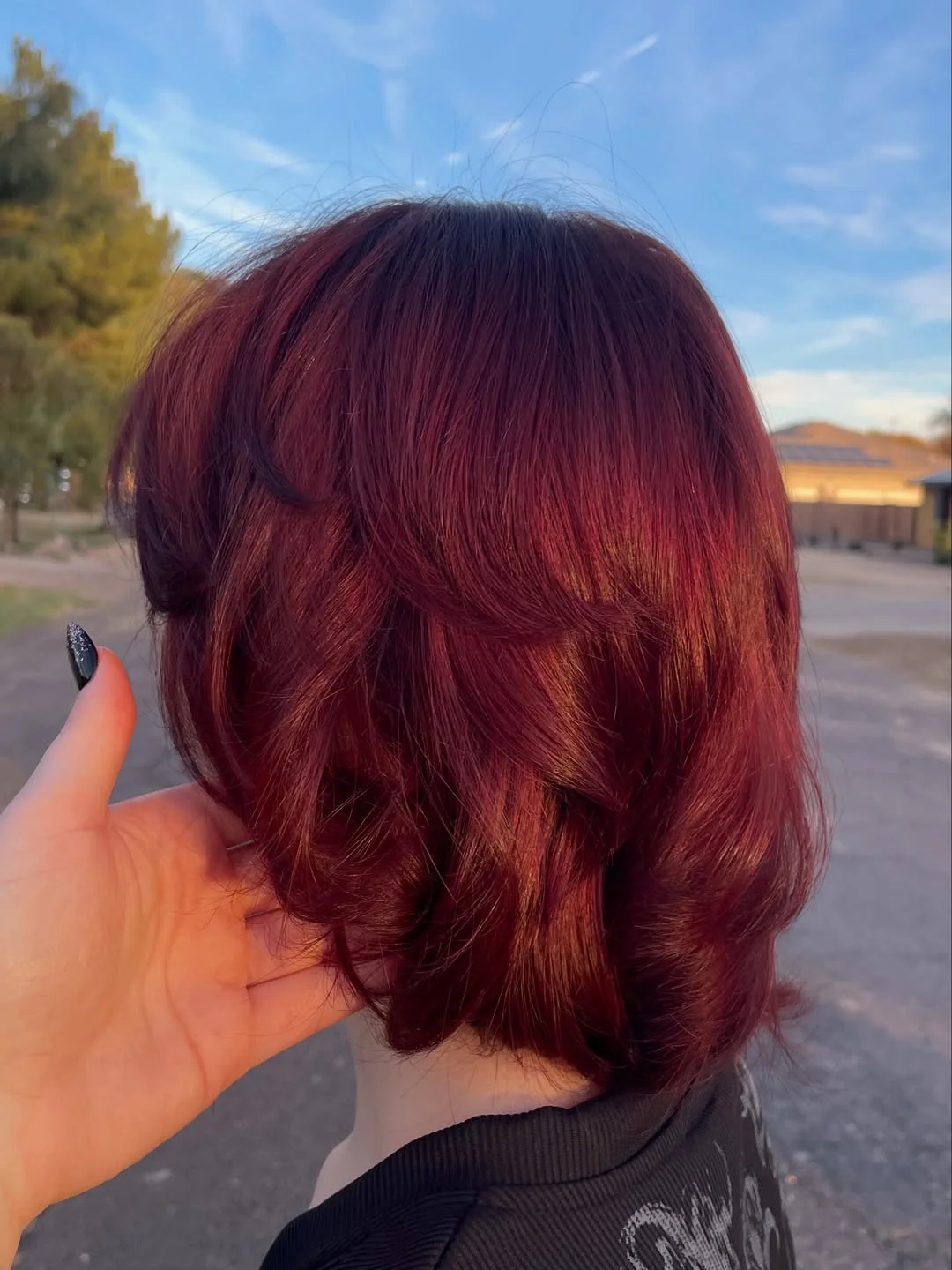 gorgeous summer hair color ideas 2026 Short Ruby Bob with Playful Summer Edge