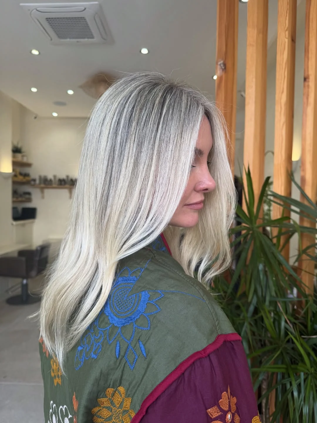 icy summer ash blonde hair color 2026 Silky Straight Ice Blonde with Minimal Layers