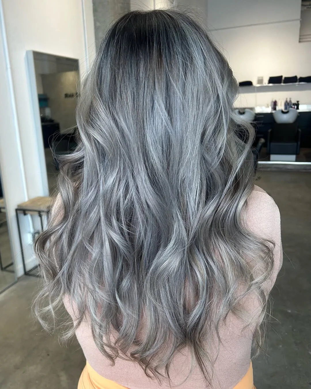 icy summer ash blonde hair color 2026 Smoky root blend with cool dimensional waves