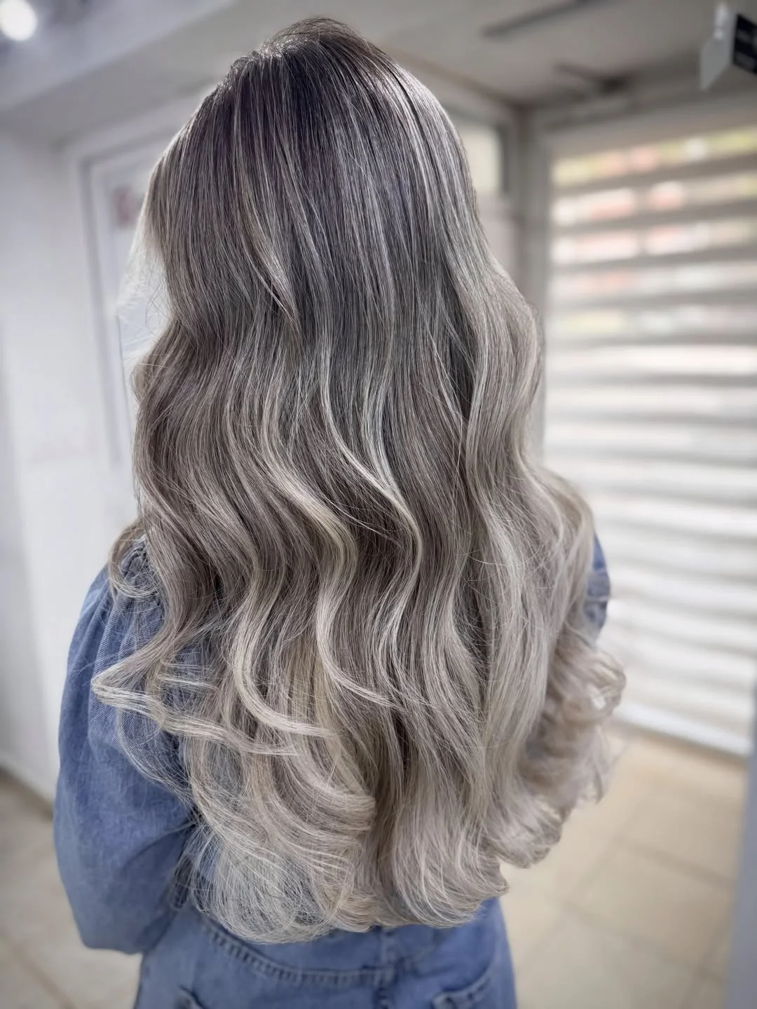 icy summer ash blonde hair color 2026 Silvery ash waves with pearl toned finish