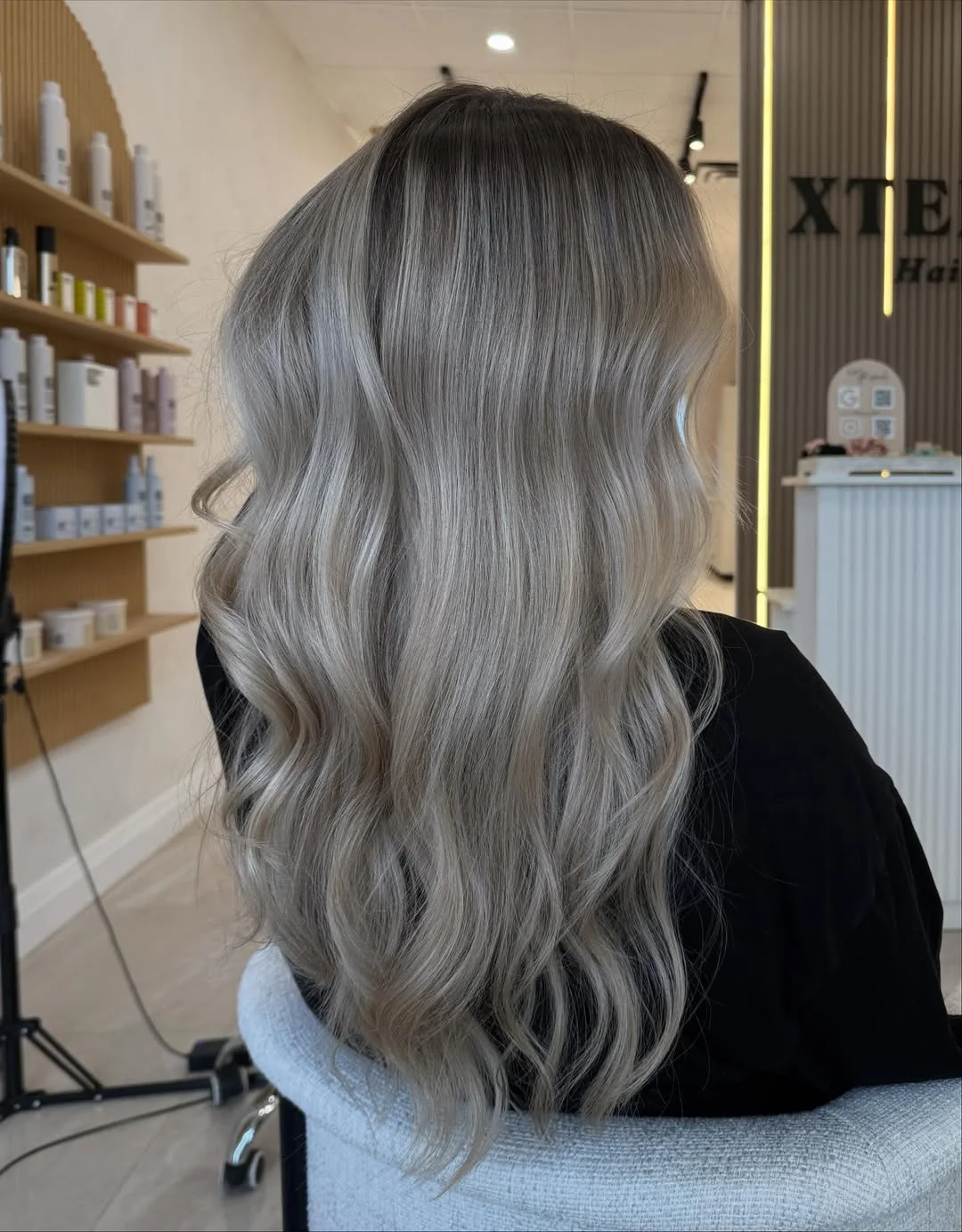icy summer ash blonde hair color 2026 Balanced ash blonde with soft milk tea undertones