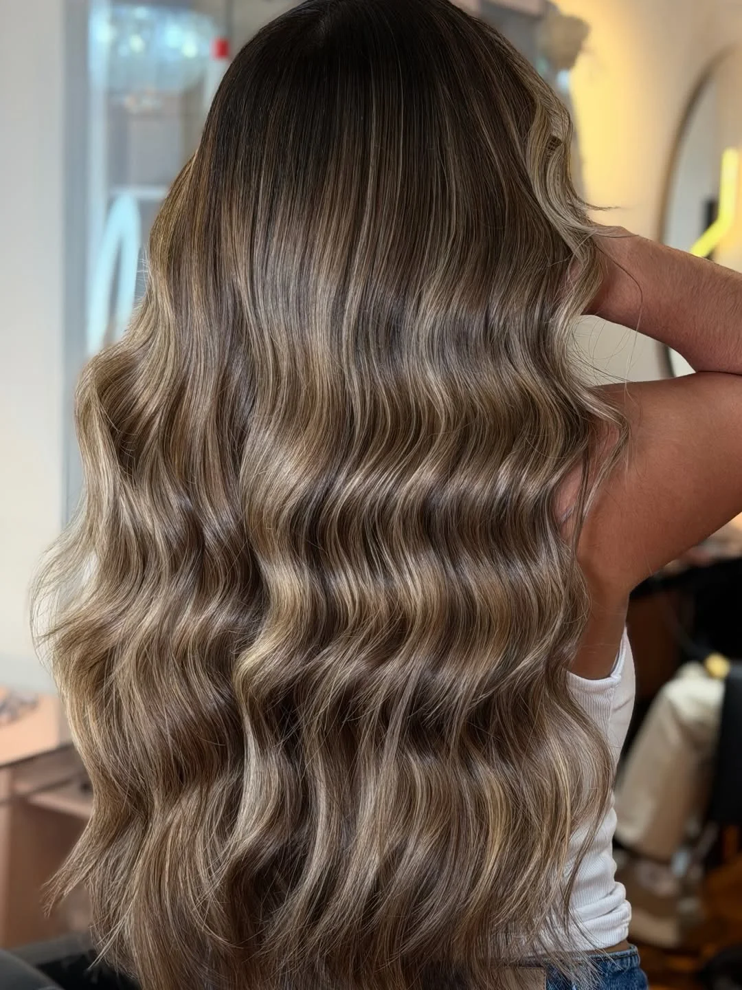 low maintenance summer hair color for brunettes 2026 Cool-Toned Smoky Brunette With a Modern Gray Whisper