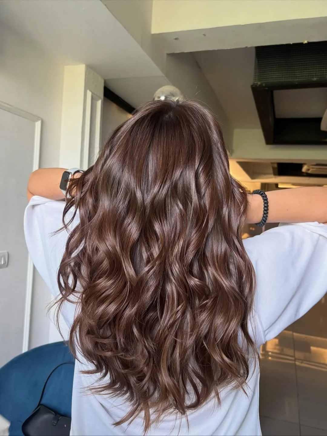 low maintenance summer hair color for brunettes 2026 Soft Chocolate Waves With Seamless Natural Shine