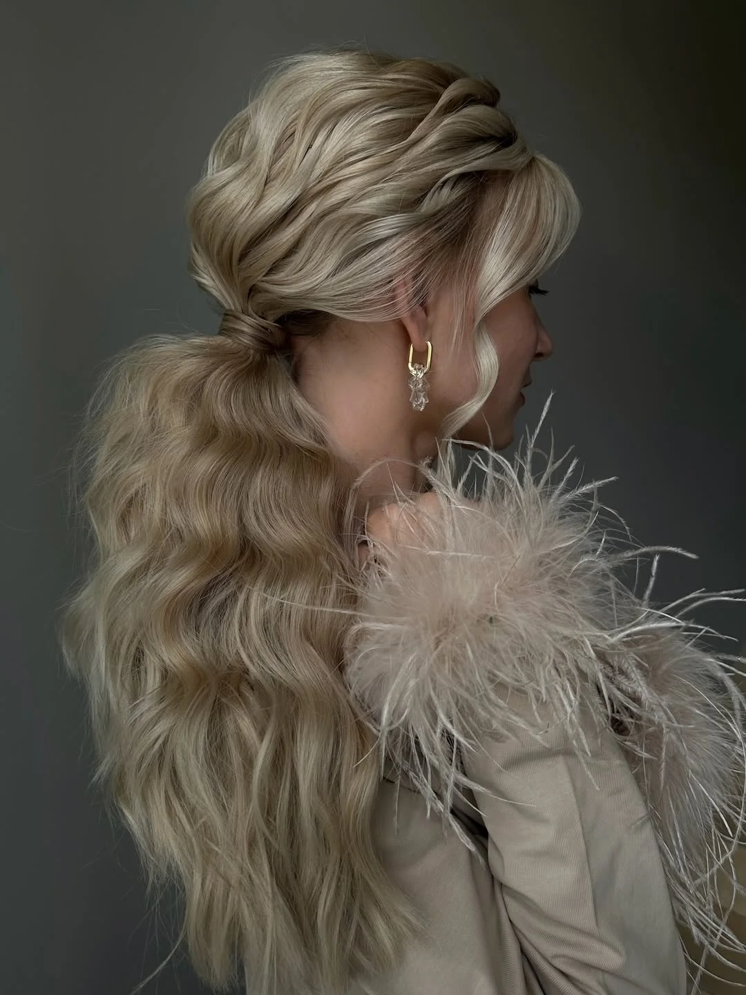 low summer ponytail hairstyle 2026 Voluminous Textured Ponytail With Side Detail
