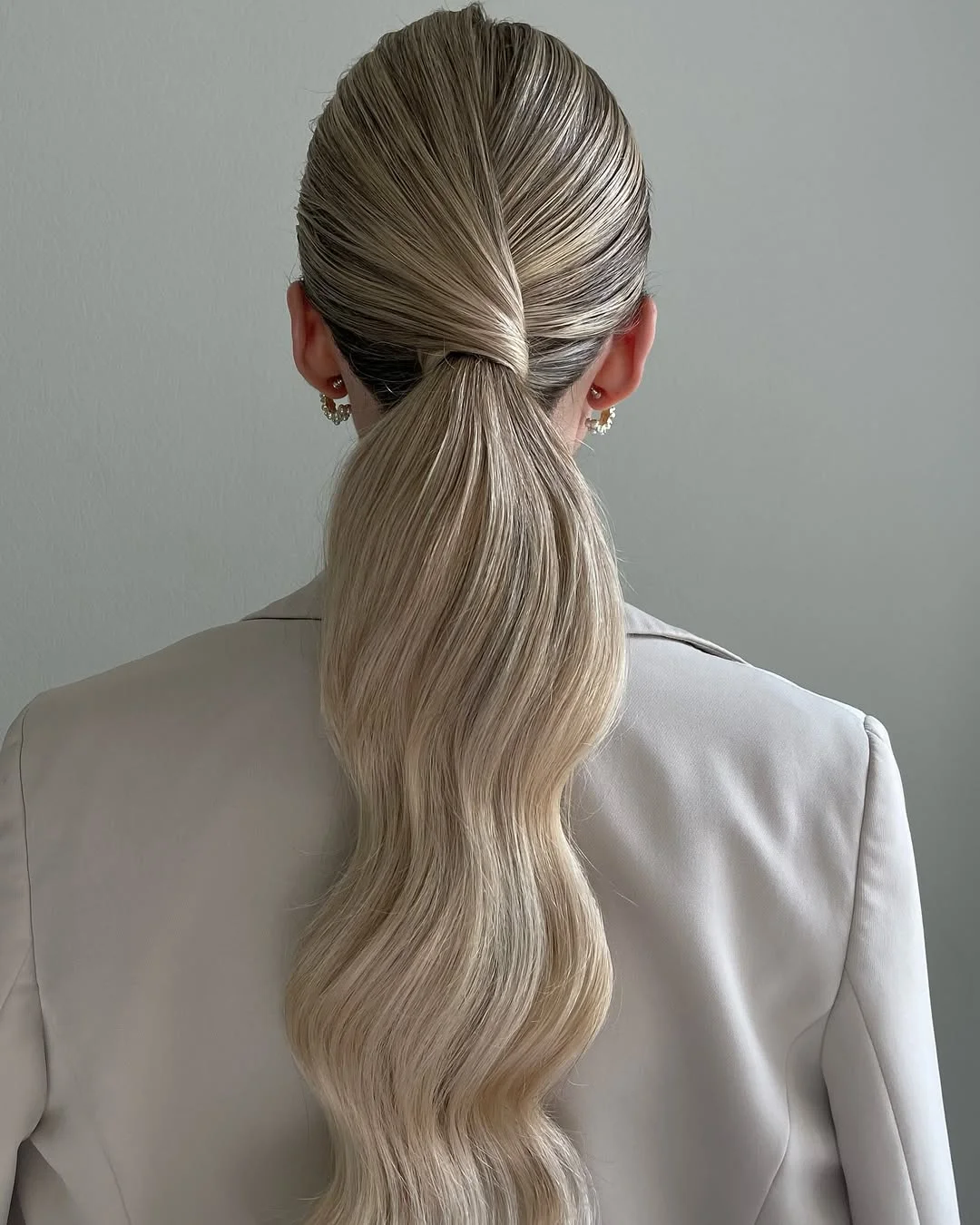 low summer ponytail hairstyle 2026 Ultra Sleek Ponytail With Glass Hair Finish