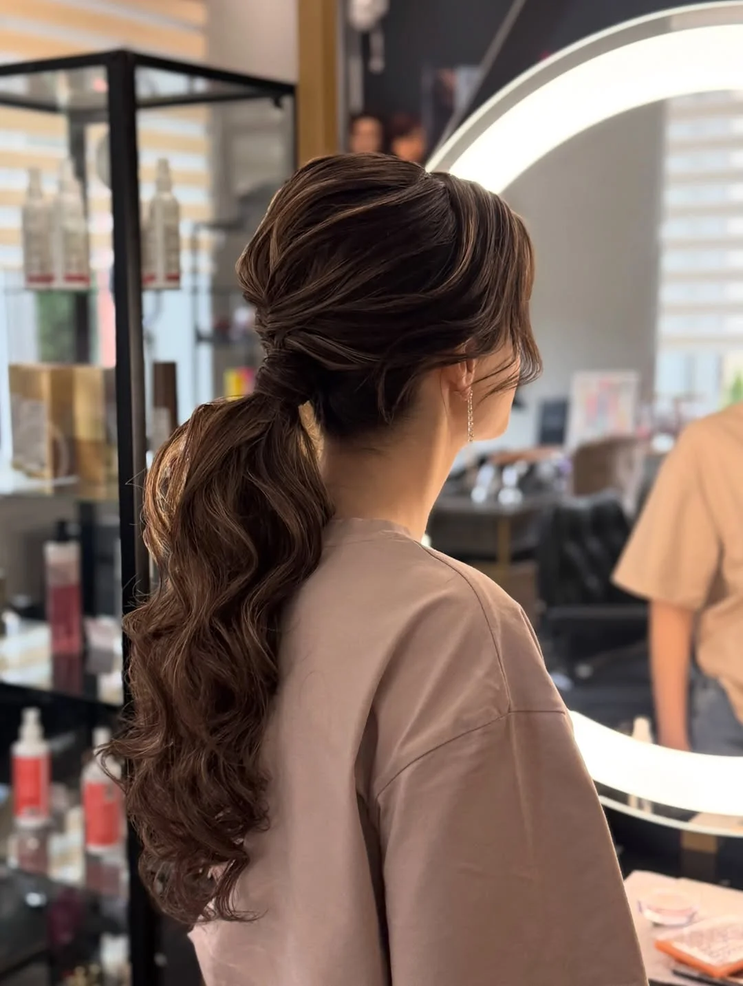 low summer ponytail hairstyle 2026 Soft Curly Ponytail For Romantic Summer Nights