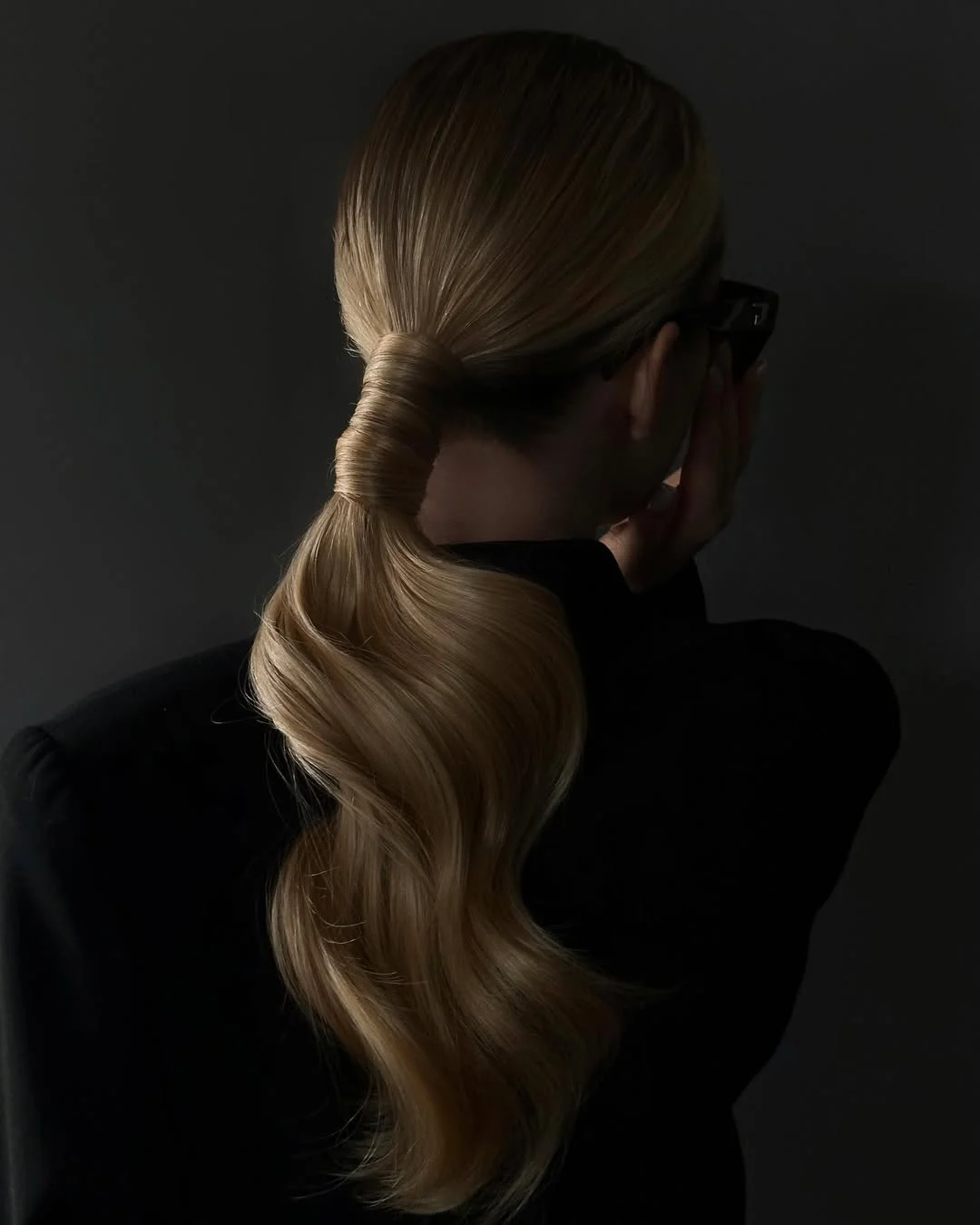 low summer ponytail hairstyle 2026 Glossy Low Ponytail With Soft Waves