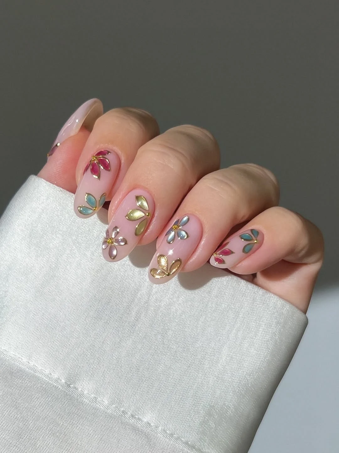 modern summer glitter nails 2026 Pastel Floral Gem Details