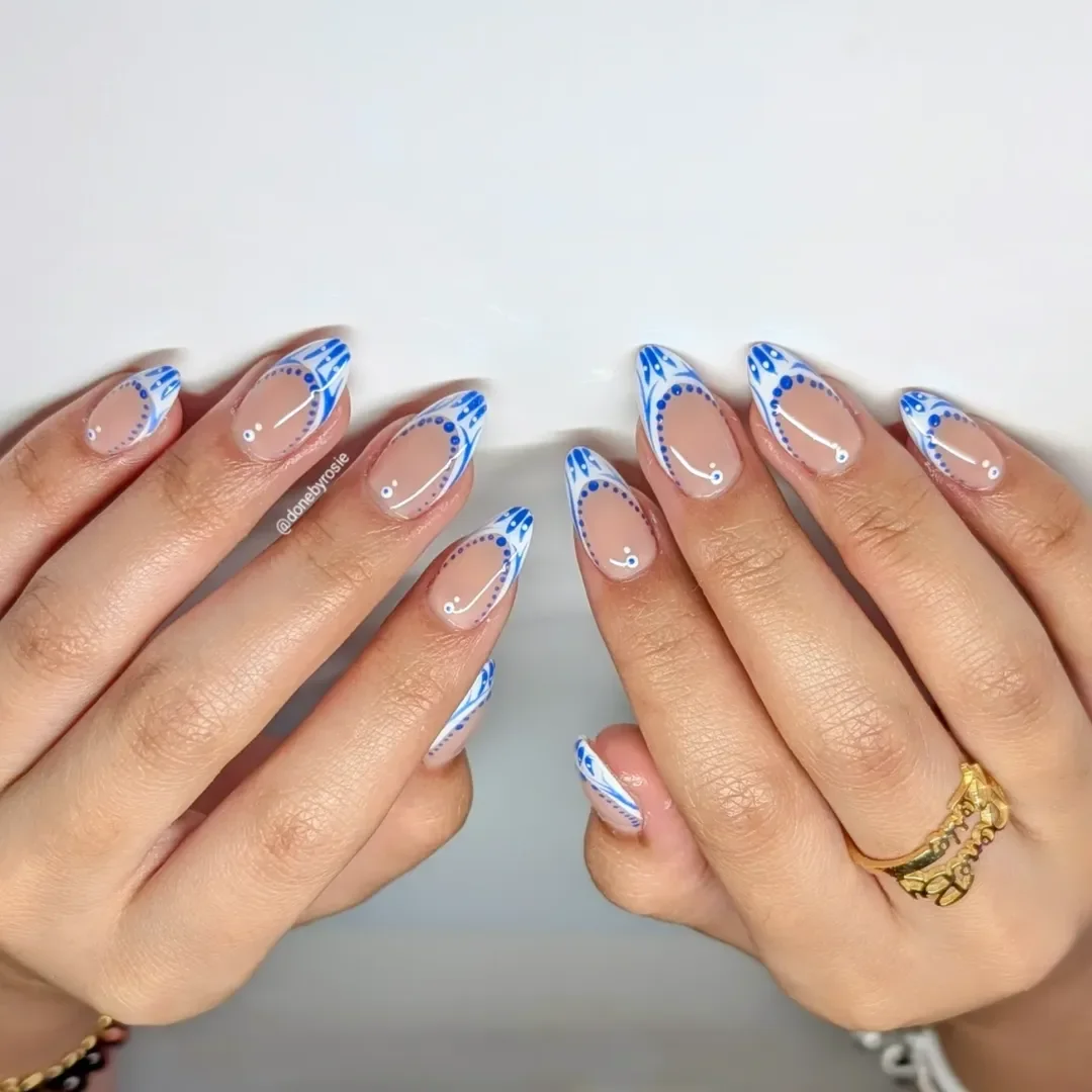 pretty summer almond nails 2026 Porcelain Blue French Tips with Delicate Details