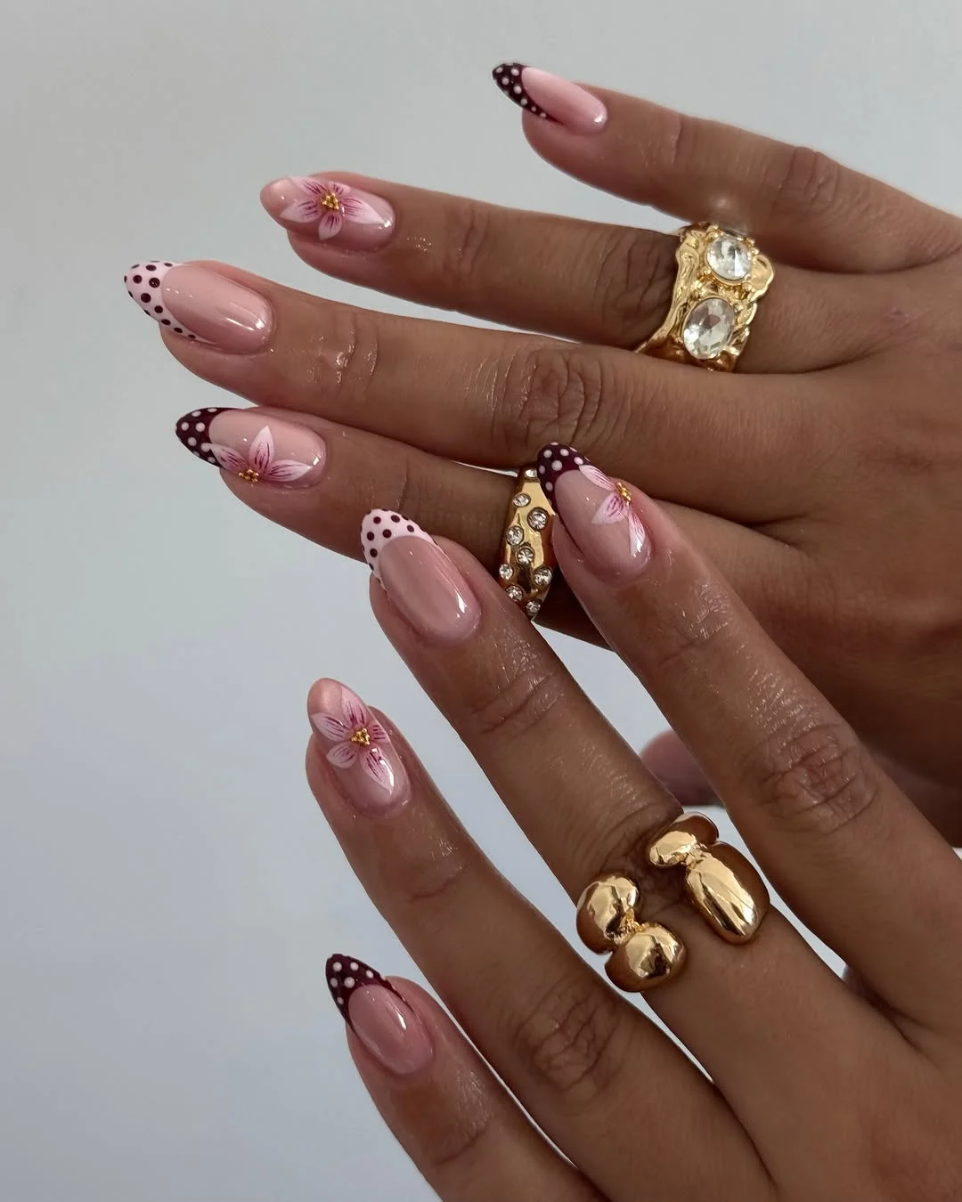 pretty summer almond nails 2026 Cherry Blossom French Tips with Polka Dot Accents