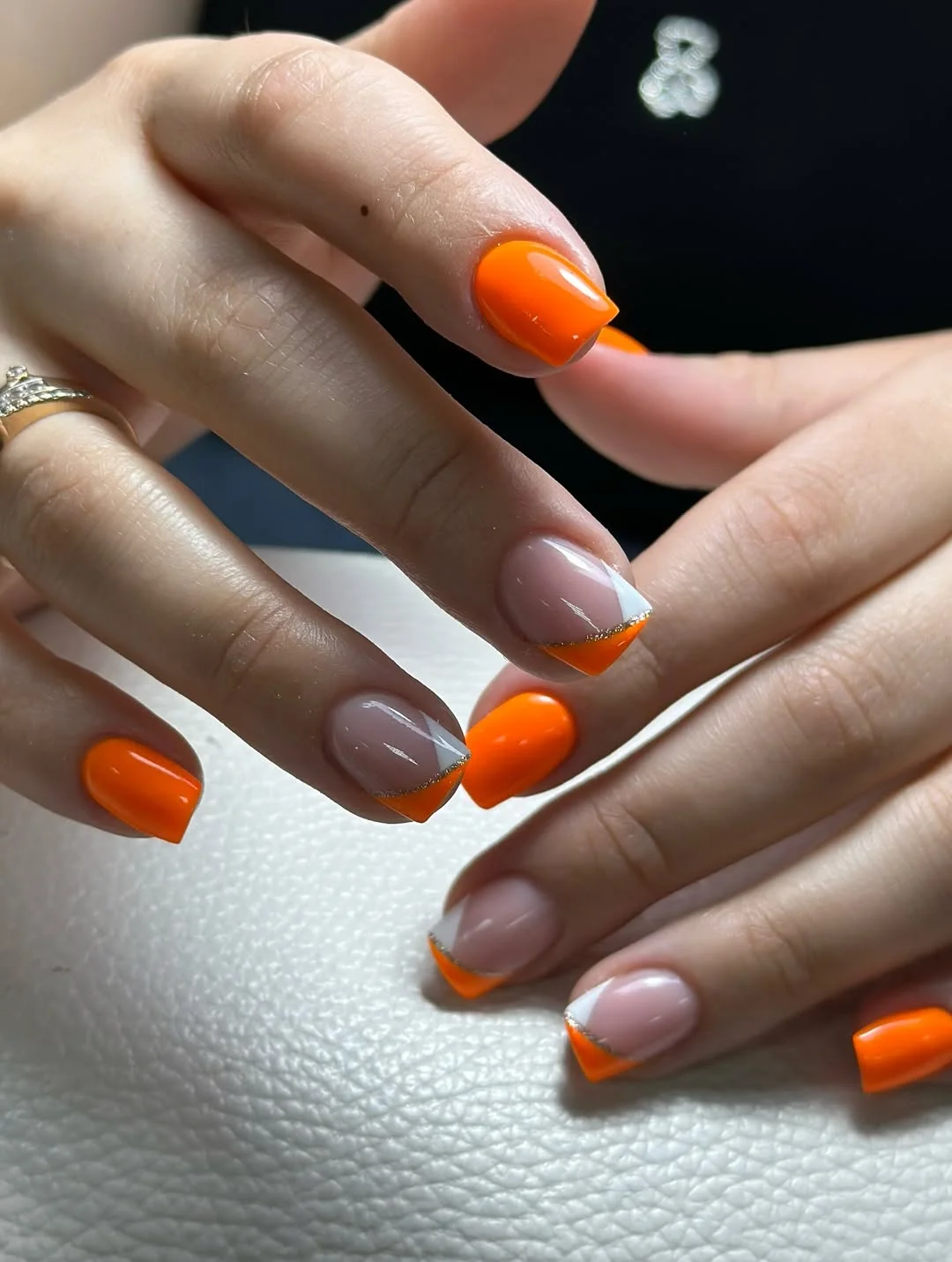 short summer nails 2026 Bright Orange French Tips That Basically Bottle Sunset Season