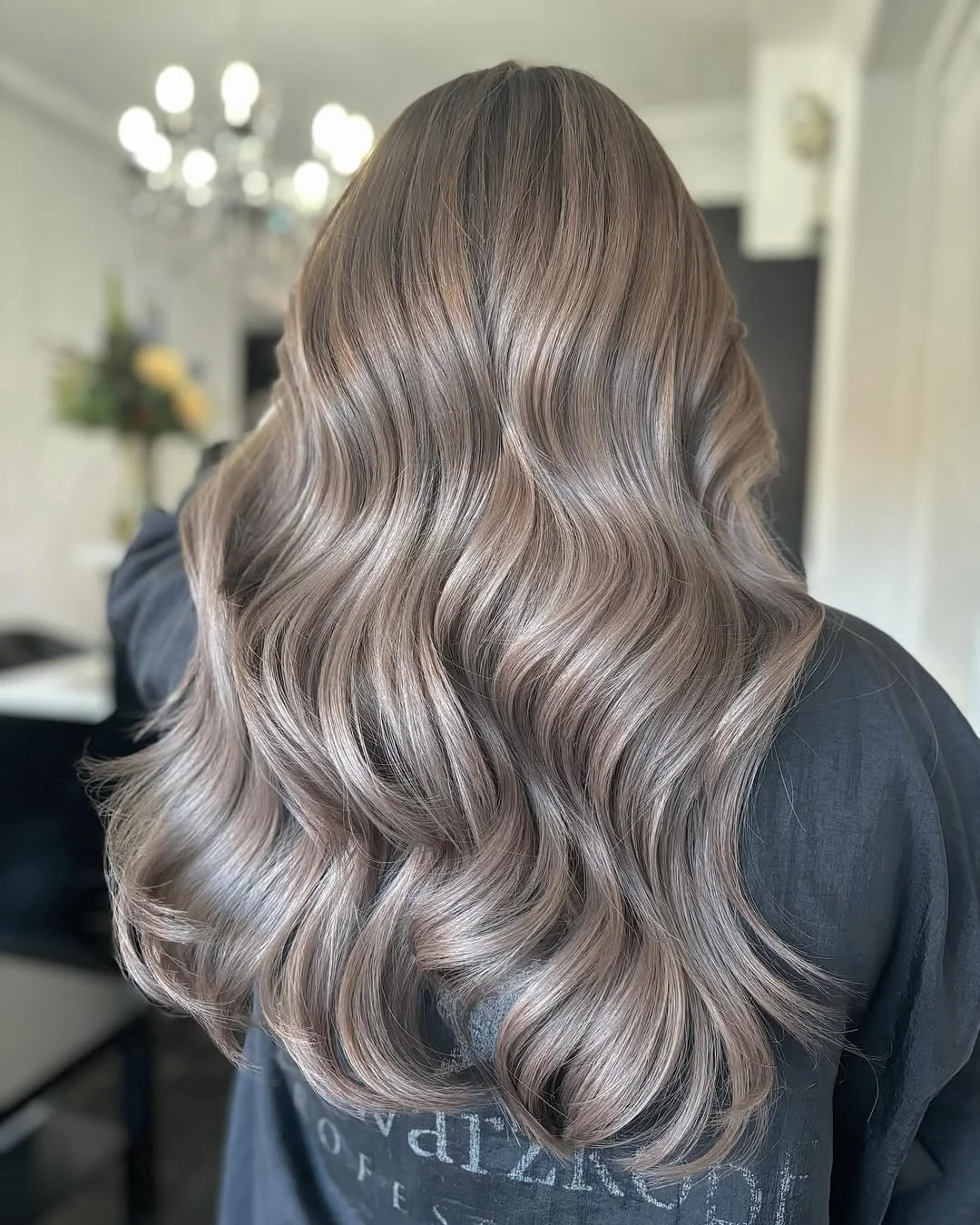 smoky summer ash brown hair color 2026 Light milk tea ash waves with soft shine
