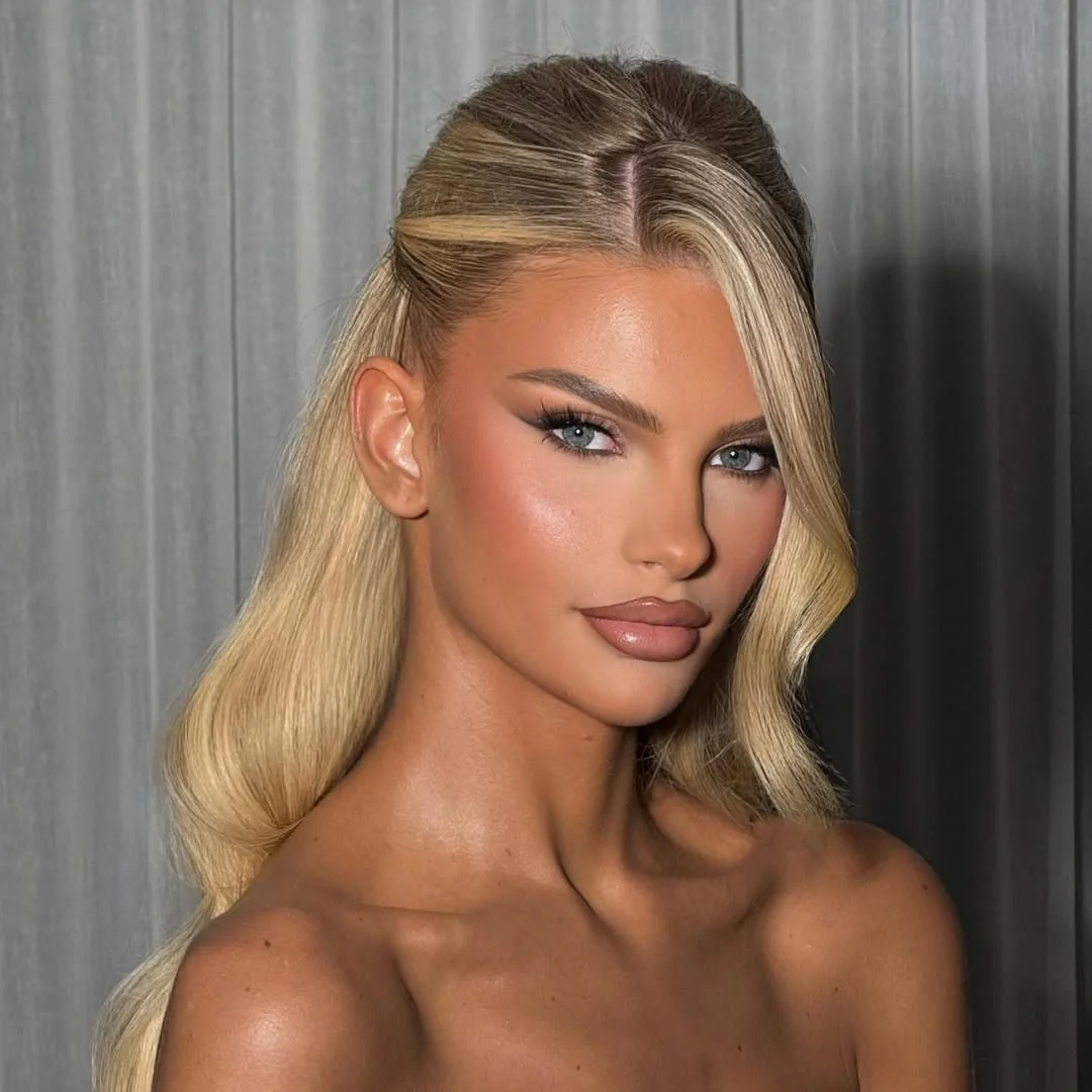 soft summer wavy hairstyle 2026 Sculpted Blonde Glam With Soft Side Waves