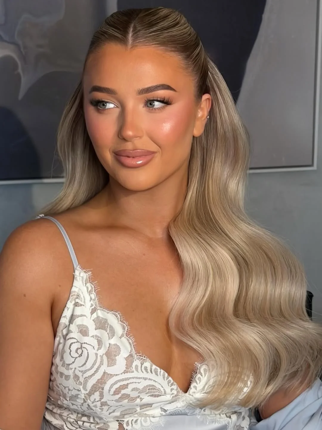 soft summer wavy hairstyle 2026 Glossy Blonde Waves With Half Up Styling