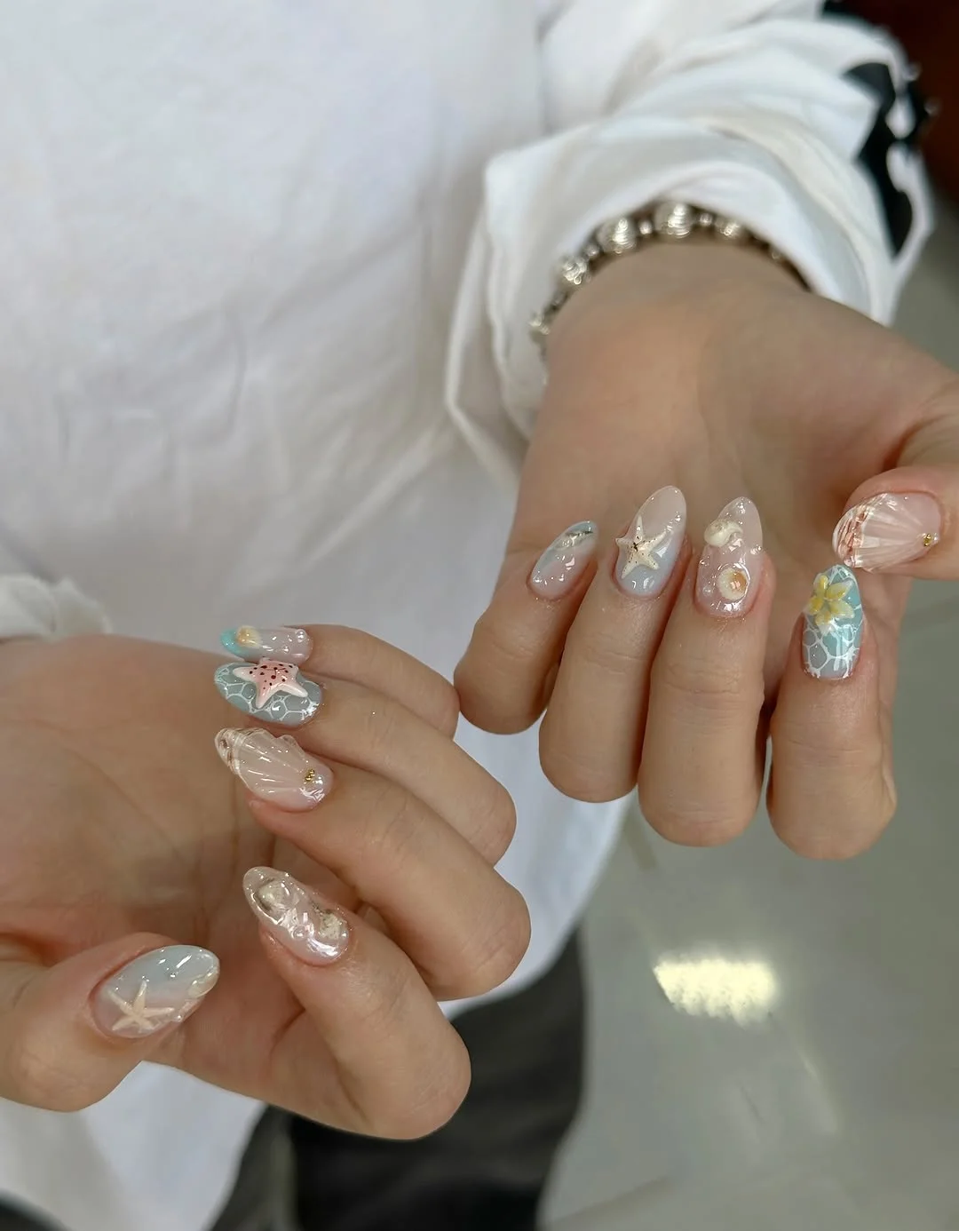 summer beach nails 2026 Soft Pearl Beach Nails With Ocean Texture