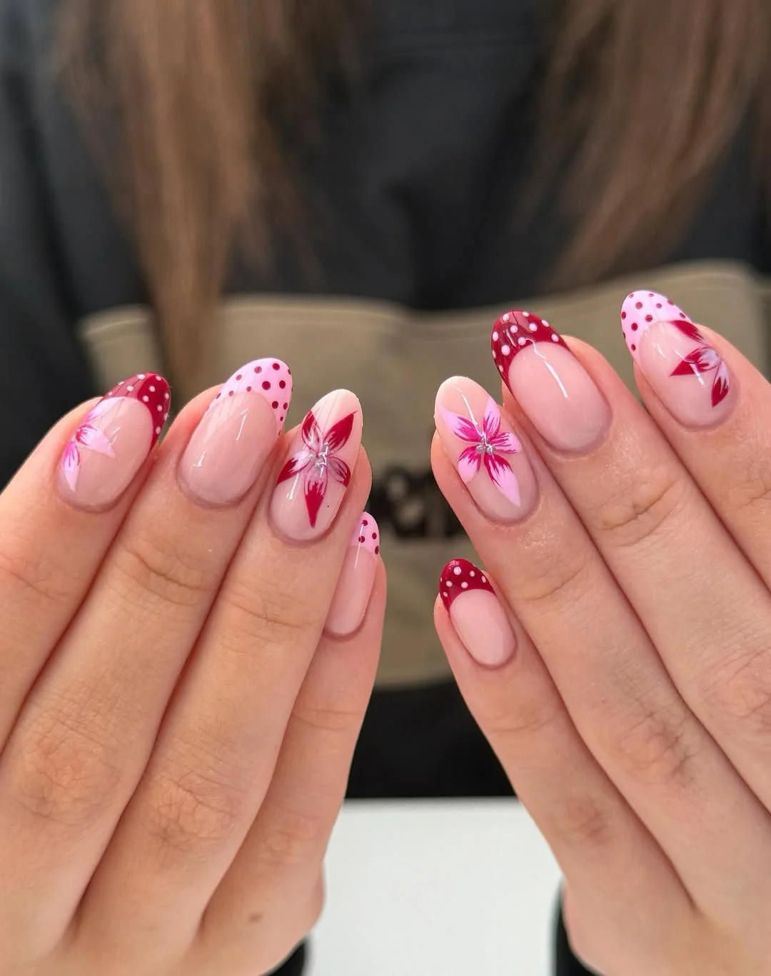 summer french tip nails 2026 Cherry Pink French Tips With Playful Floral Details