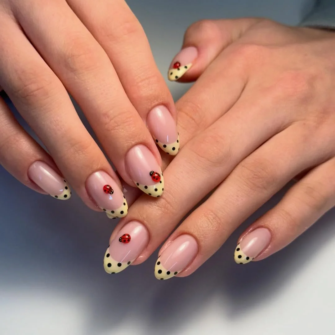 summer french tip nails 2026 Playful Polka Dot French Tips With Tiny Ladybug Details