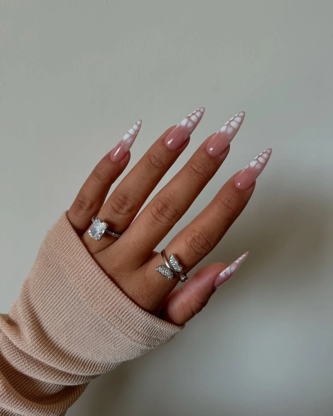 summer gel nails 2026 Soft White Aura Stiletto Nails
