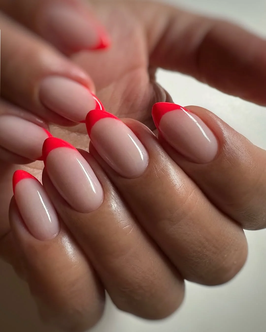 summer manicure color ideas 2026 Neon Coral French Tip Nails