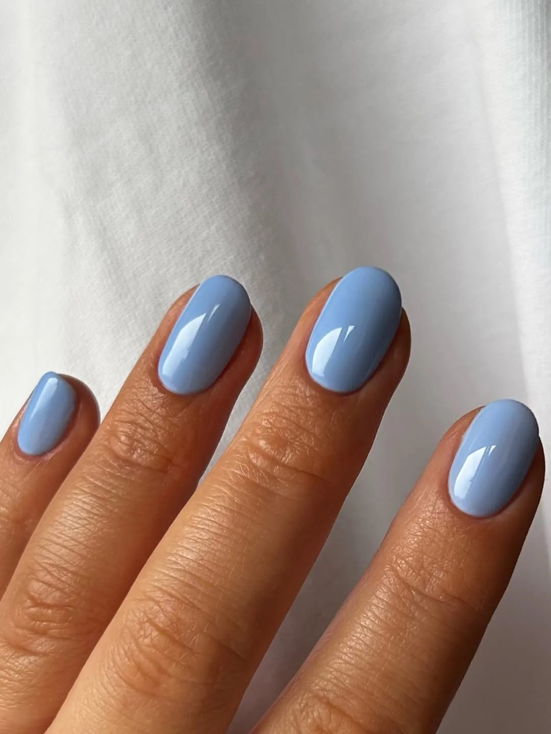 summer manicure color ideas 2026 Cloudy Blue Gloss Nails That Feel Expensive