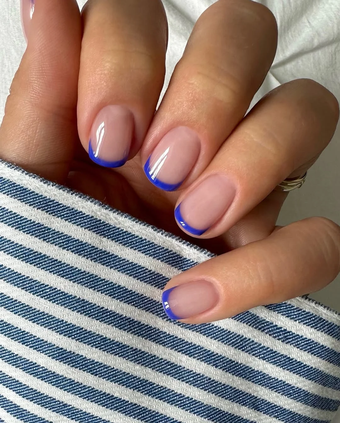 summer manicure color ideas 2026 Electric Blue French Tips With A Clean Minimal Finish