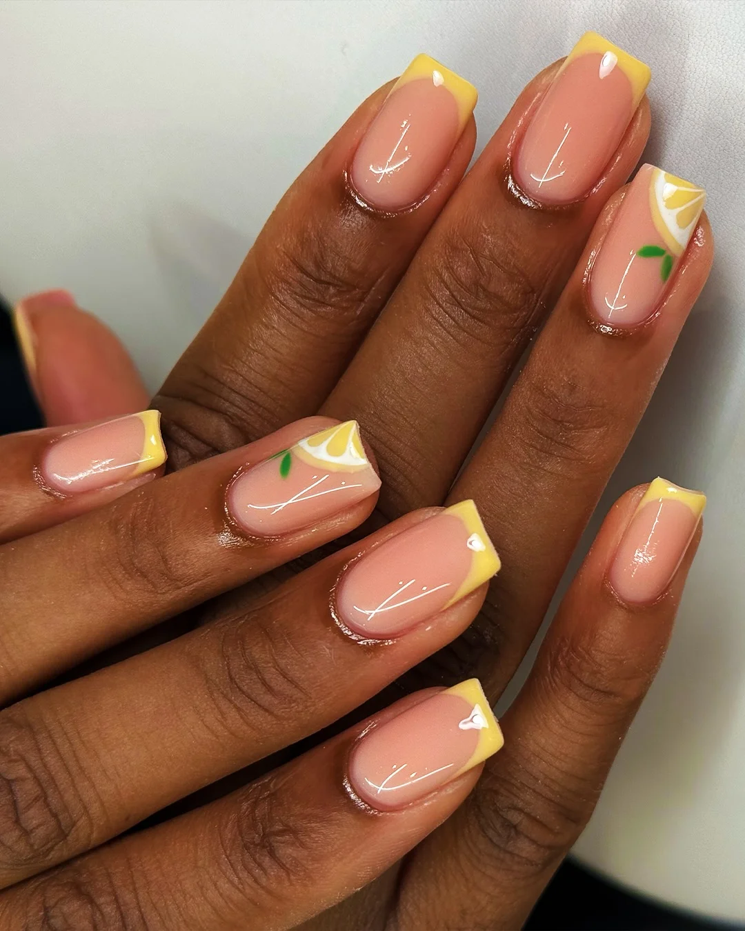 summer manicure color ideas 2026 Lemon French Tips With Fresh Citrus Details
