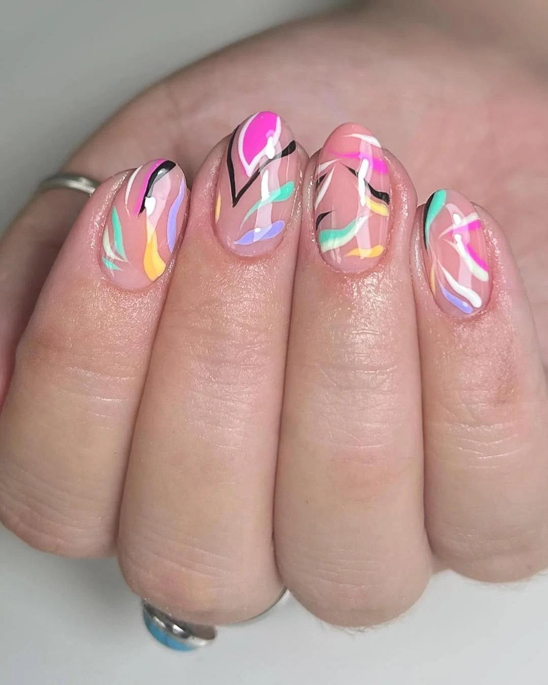 summer manicure color ideas 2026 Abstract Candy Swirls With Retro Summer Energy