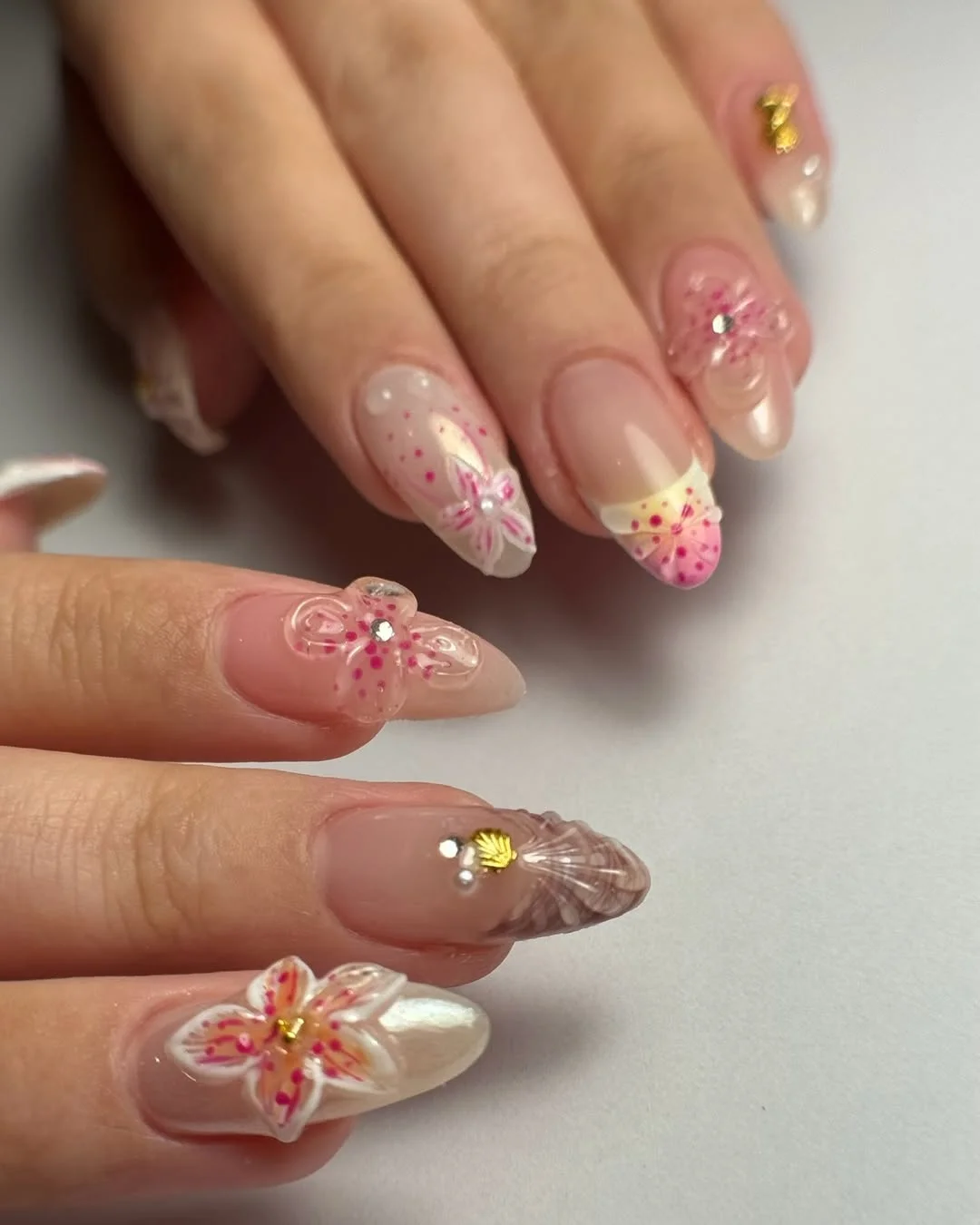 summer manicure color ideas 2026 Glossy 3D Floral Nails With Mermaid Details