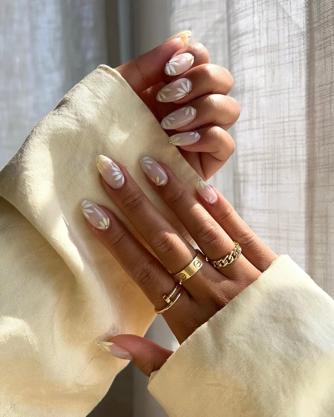 summer nail art 2026 Soft White Floral Nails For Quiet Luxury Summer Looks