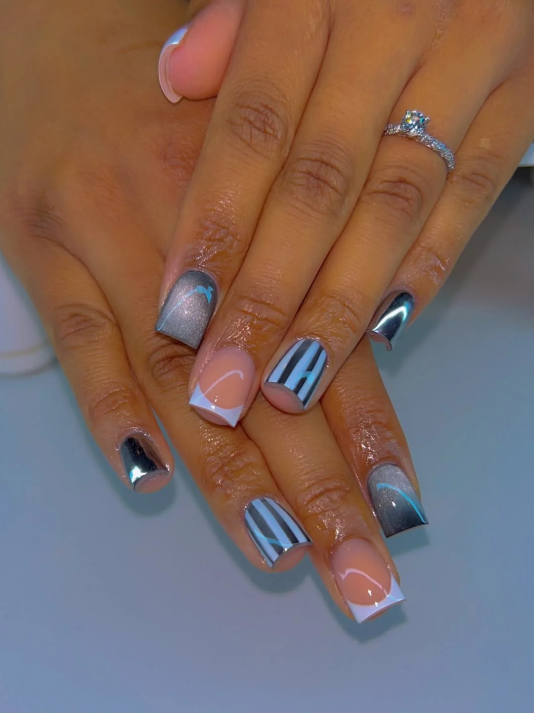 Summer nail art ideas 2026 Chrome French Nails with Futuristic Silver Details