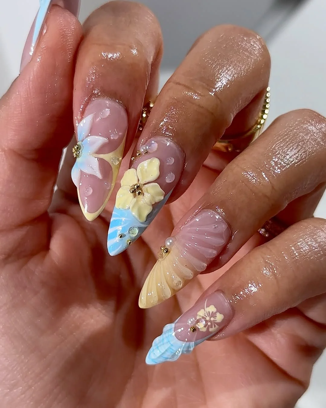 Summer nail art ideas 2026 Pastel 3D Flower Nails with Mermaid Summer Energy