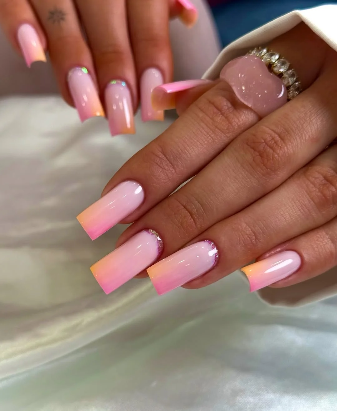summer ombre nails 2026 Pink Sunset Ombre Nails With A Glossy Summer Fade