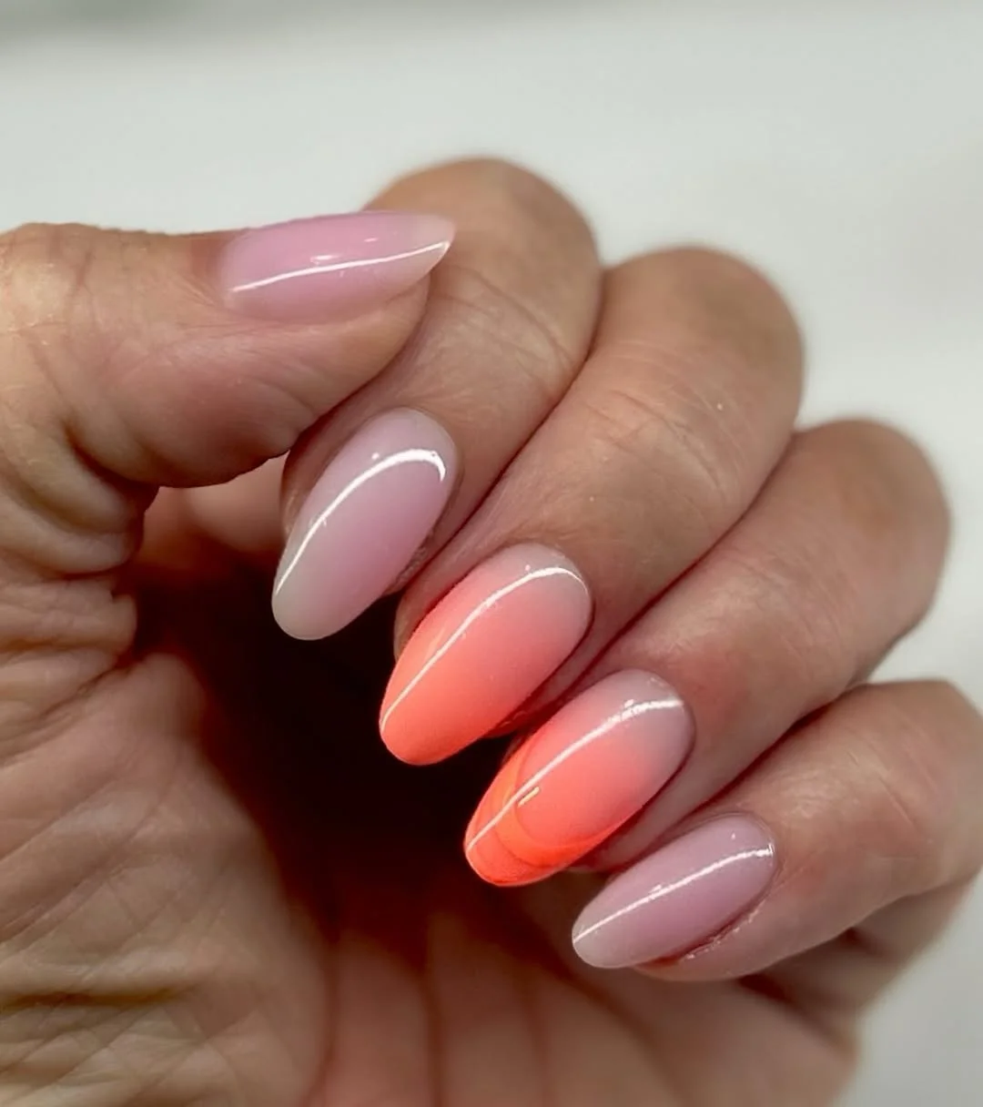 summer ombre nails 2026 Simple Coral Ombre Almond Nails For Minimal Summer Looks