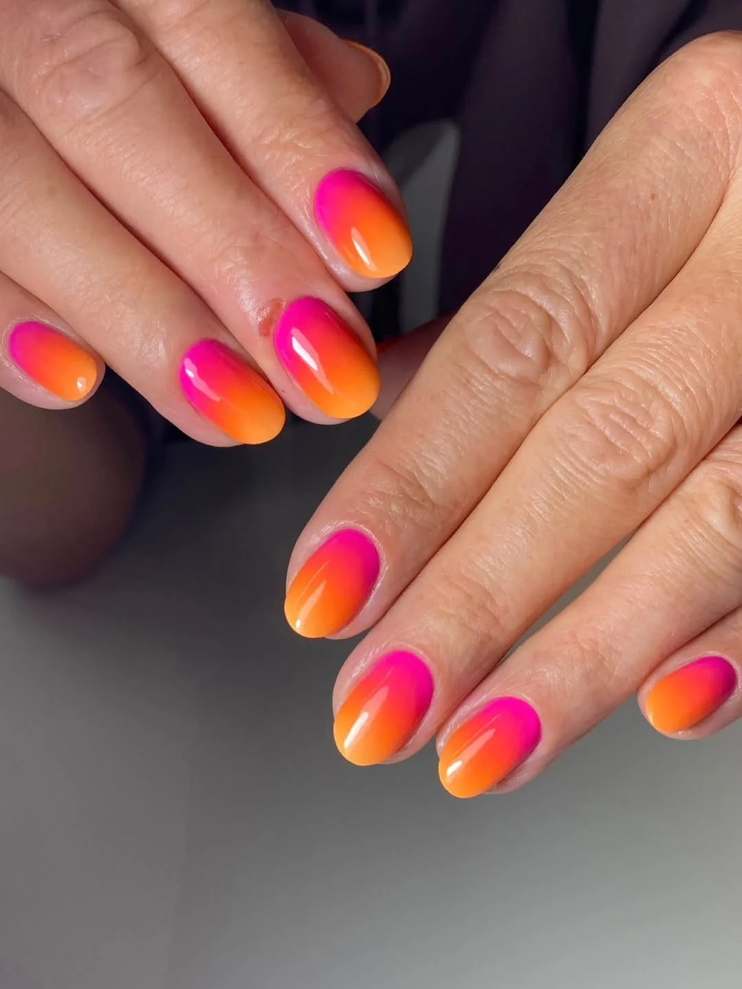summer ombre nails 2026 Bright Pink And Orange Ombre Nails For A Tropical Pop