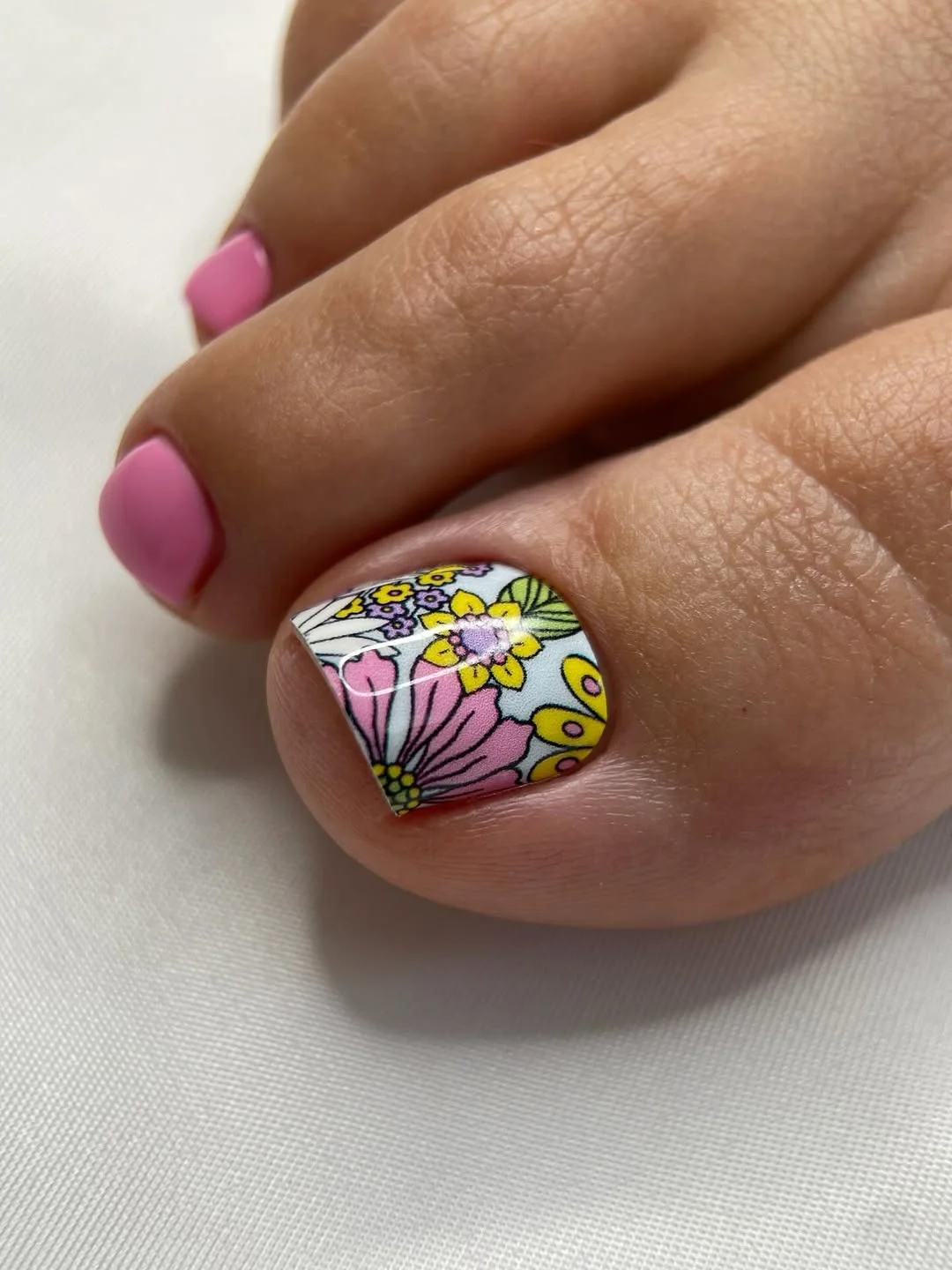 summer pedicure colors 2026 Soft Pink Florals With Retro Energy
