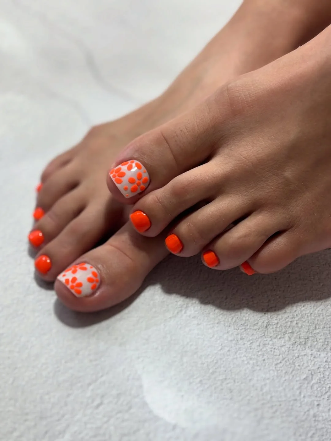 summer pedicure colors 2026 Bright Orange Floral Summer Pedicure