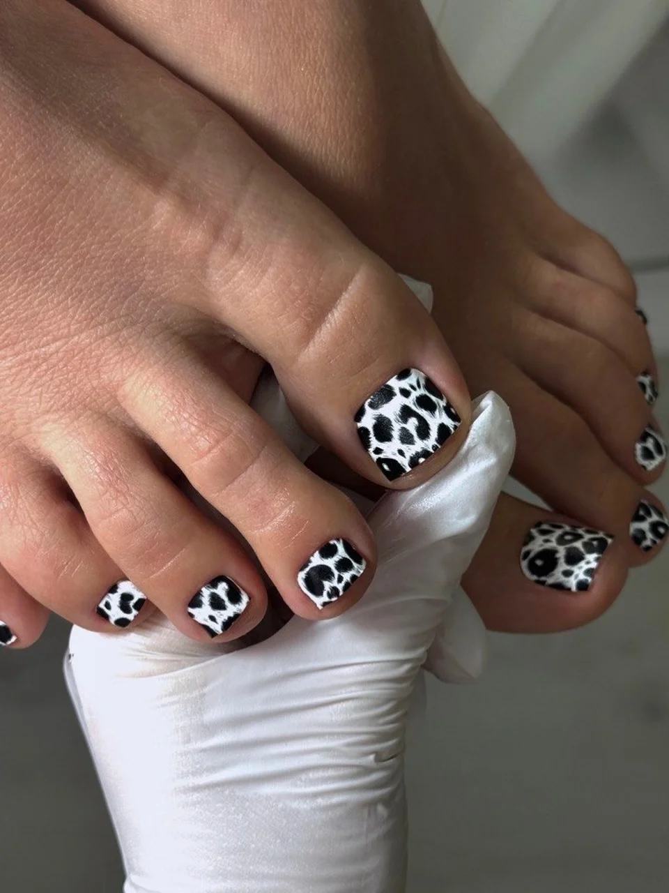 summer pedicure colors 2026 Black And White Cow Print For Cool-Girl Summer