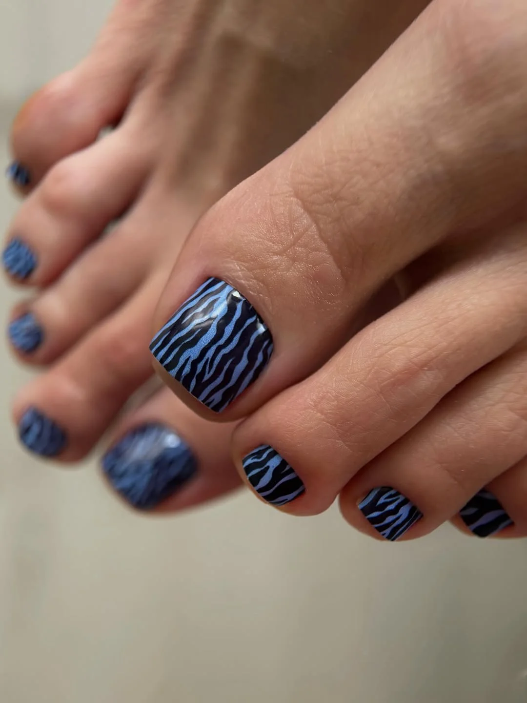 summer pedicure colors 2026 Blue Zebra Pedicure With Cool-Toned Drama