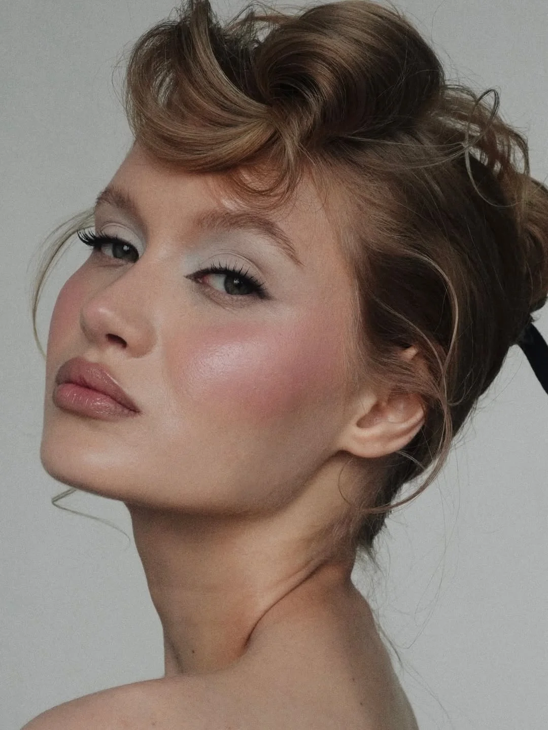 summer shag hairstyle 2026 Vintage-Inspired Shag With Sculpted Bangs