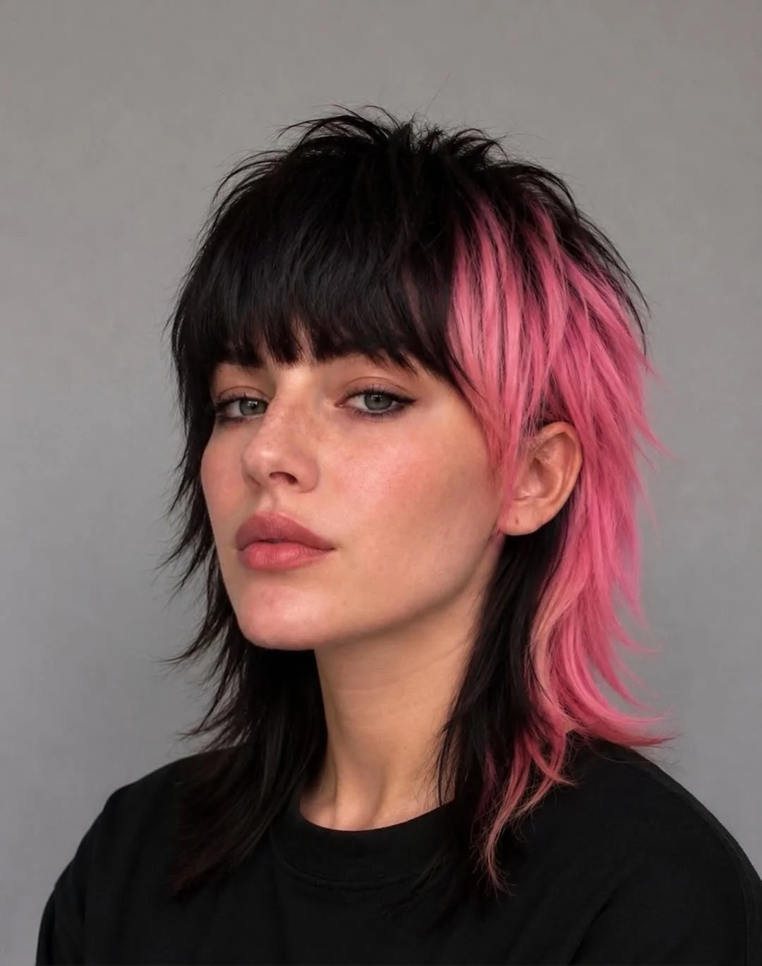 summer shag hairstyle 2026 Edgy Pink Shag With Choppy Bangs