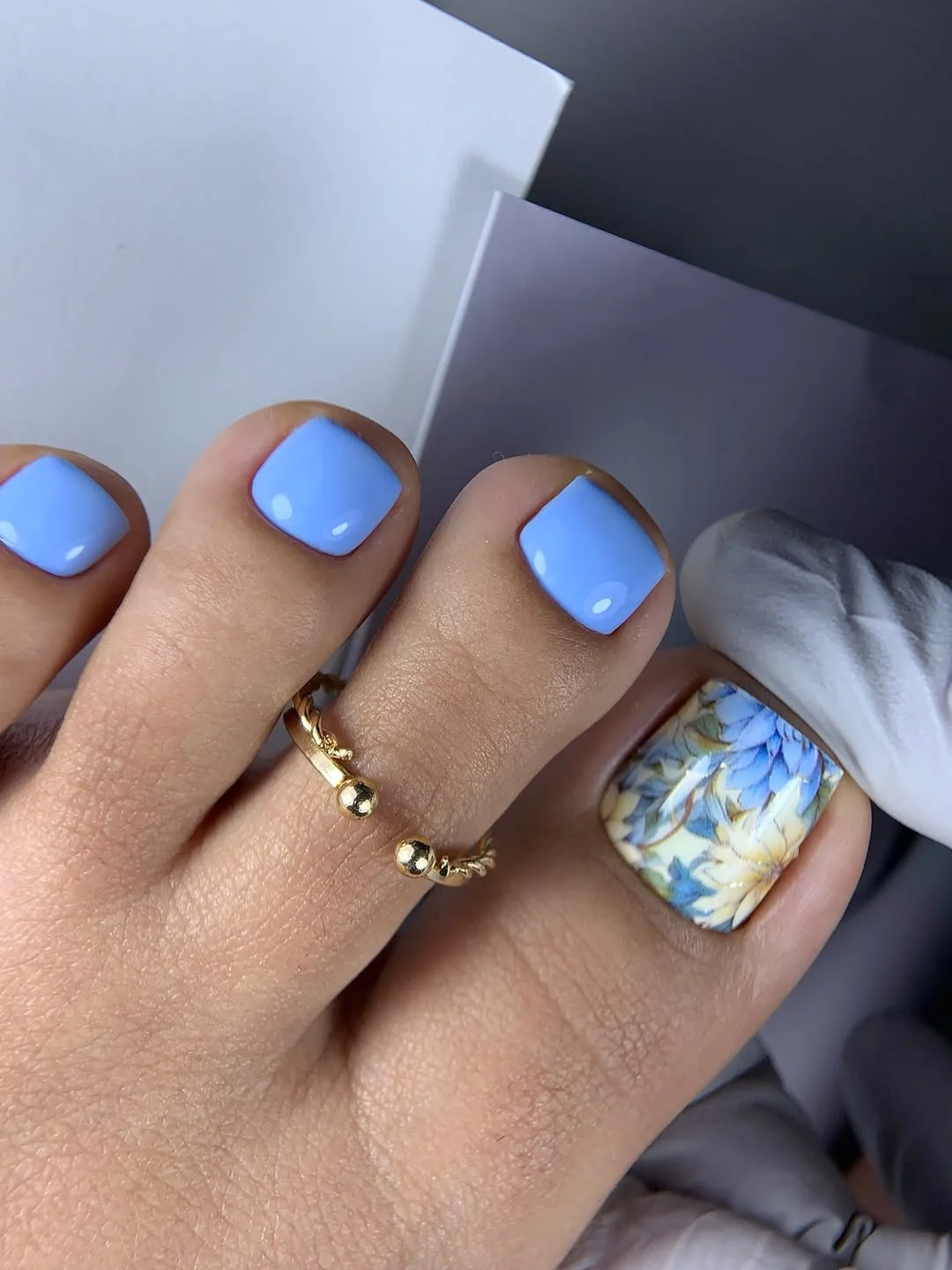 summer toe nails colors 2026 Bright Blue Pedicure With Artistic Accent Nail