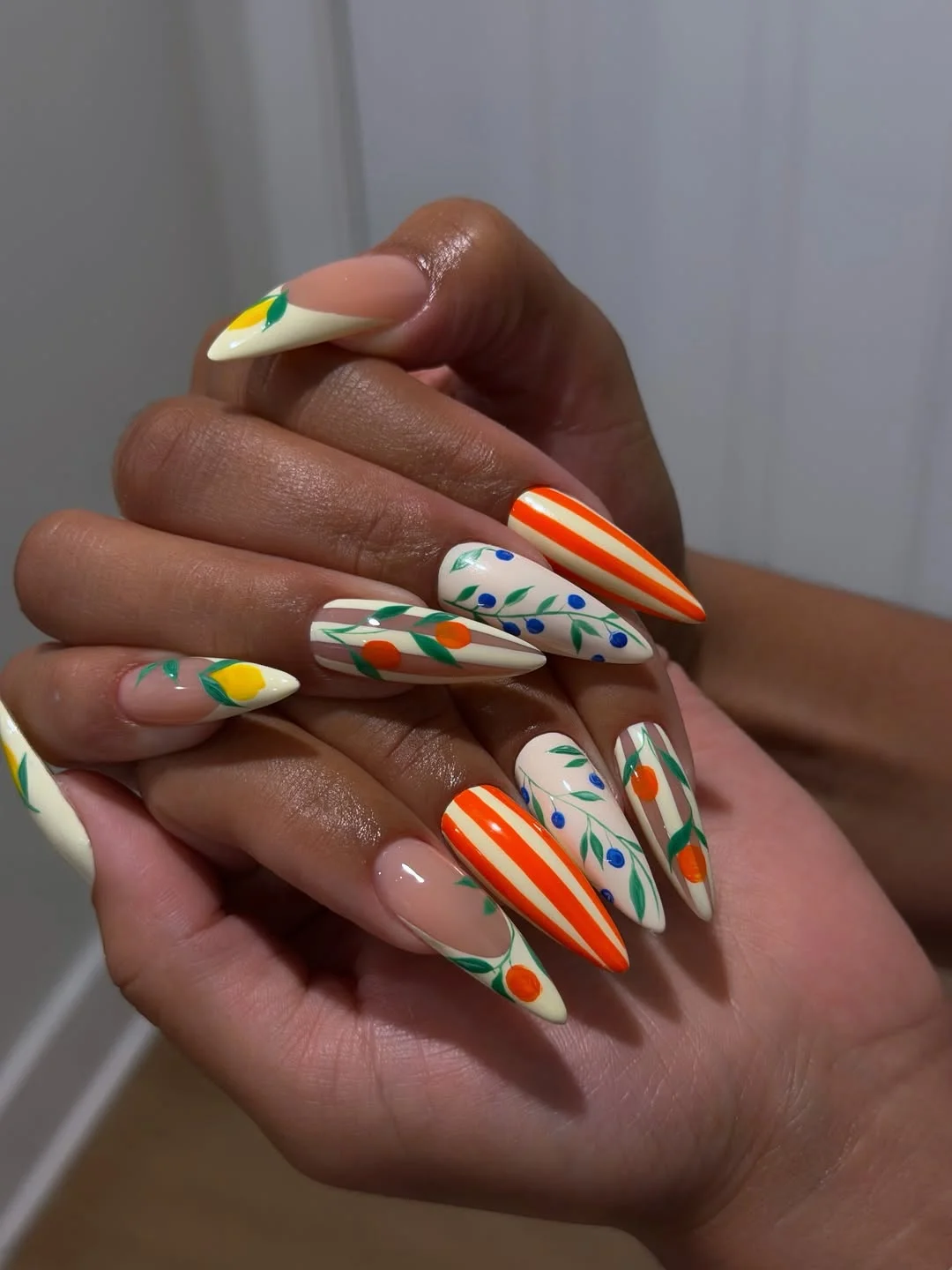 summer vibrant nails summer 2026 Citrus Garden Stiletto Nails