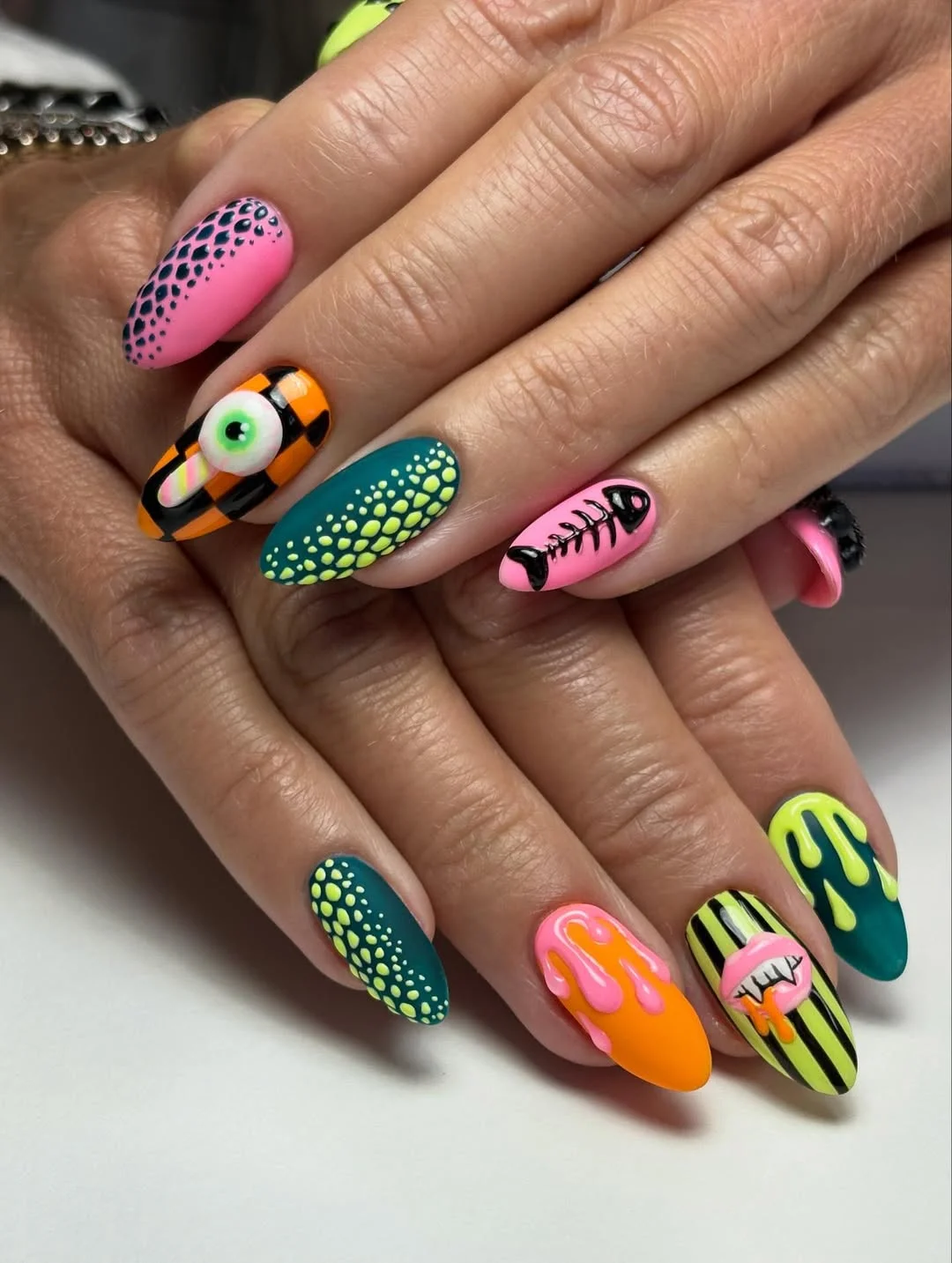 summer vibrant nails summer 2026 Playful Pop Art Almond Nails