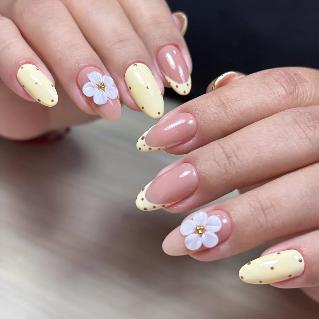 Summer yellow nails 2026 Butter Yellow Daisy Almond Nails