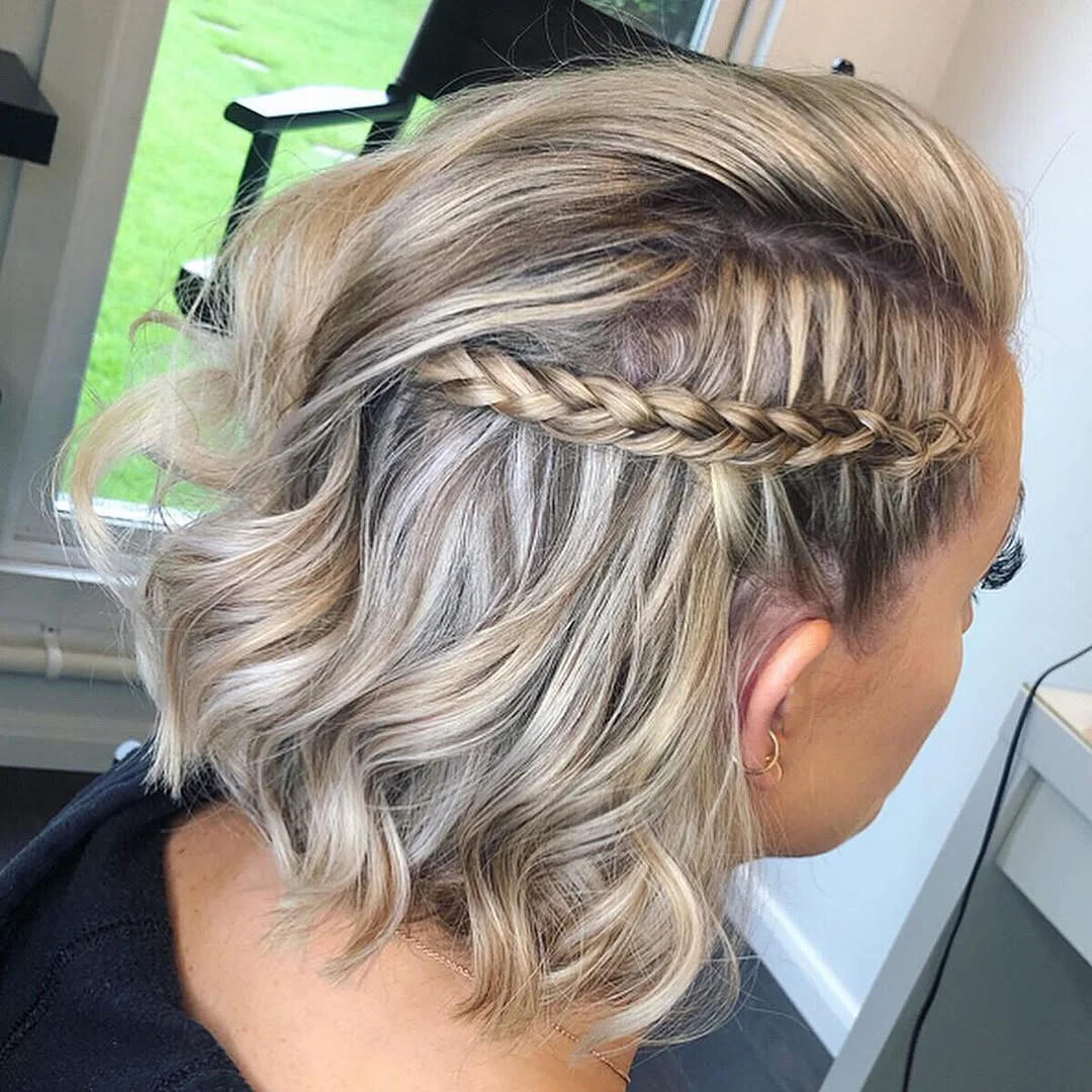 textured summer short hairstyles 2026 Side Braid With Dimensional Blonde Waves