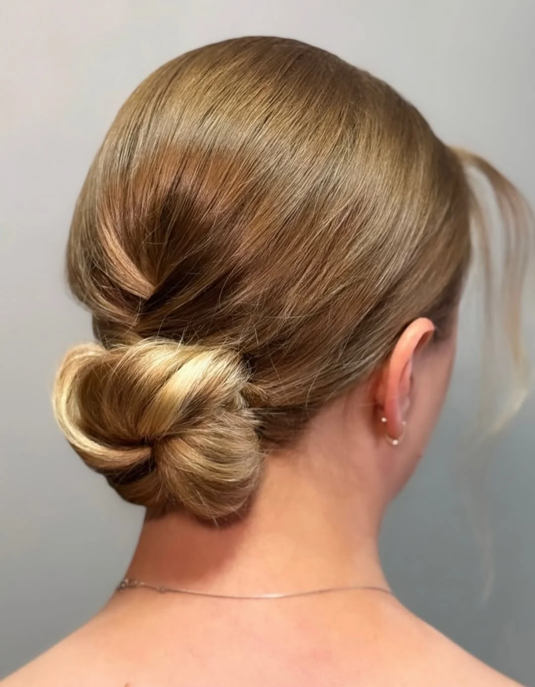 textured summer short hairstyles 2026 Soft Folded Blonde Chignon
